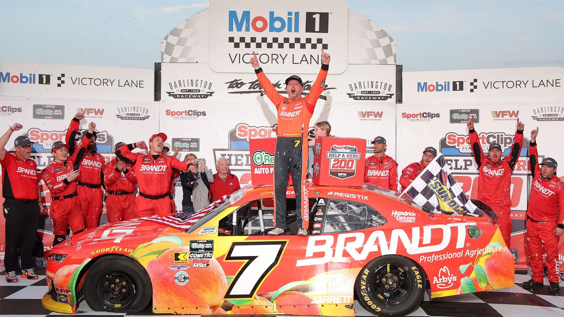 Justin Allgaier and Team in K1 Custom Race Suits in Victory Lane at Darlington