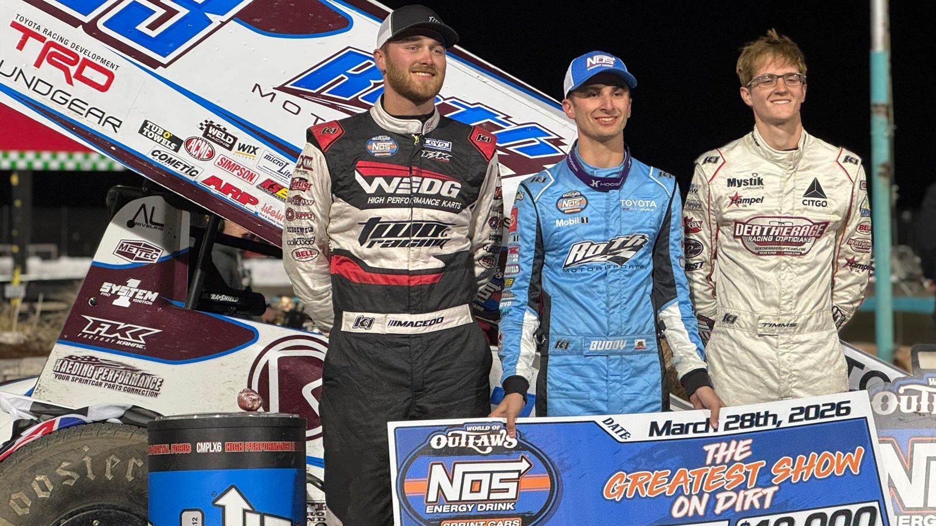 K1 Driver's Podium - Kofoid, Timms, macedo in K1 Custom Suits