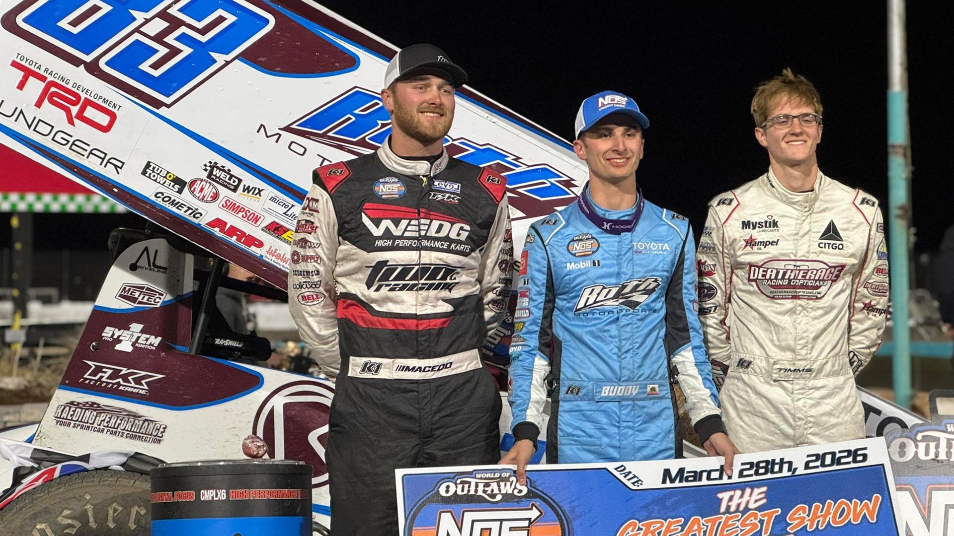 K1 Driver's Podium - Kofoid, Timms, macedo in K1 Custom Suits