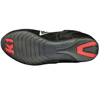 The bottom tread of the Challenger nomex racing shoe in black featuring red accents on tread